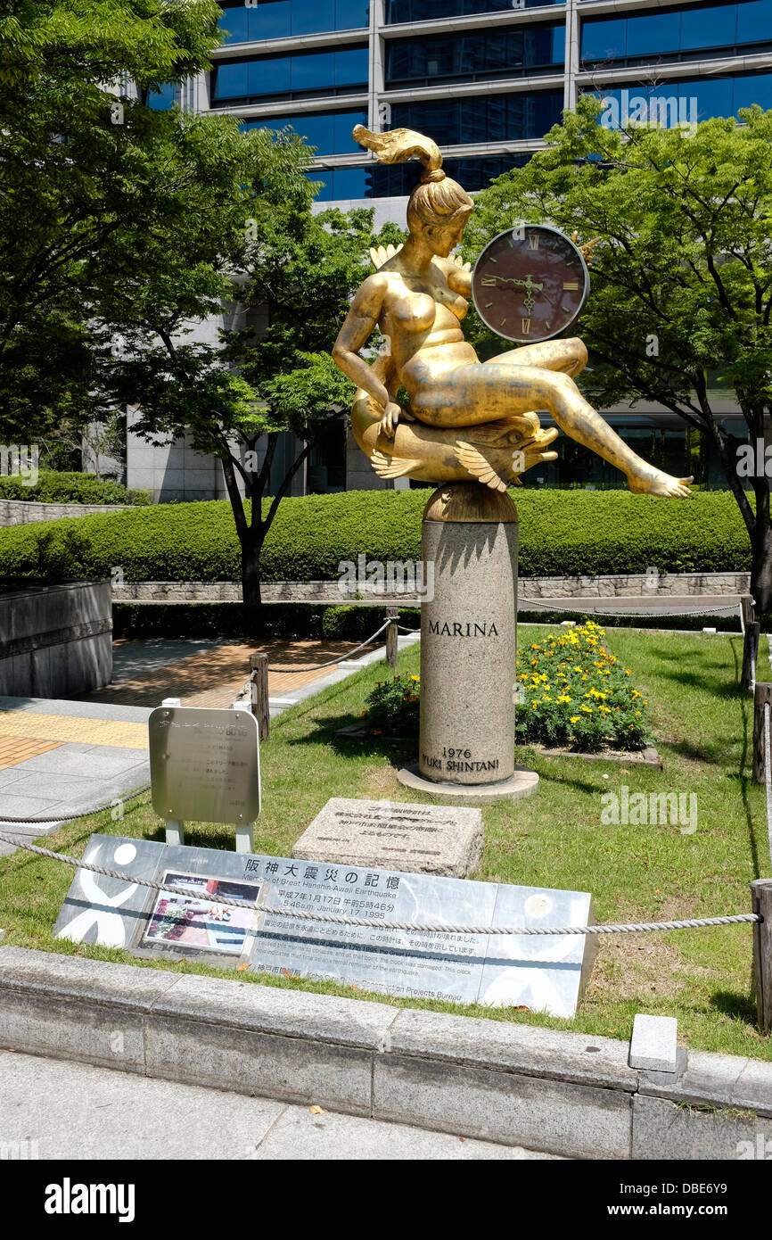 Statue and clock showing time of Kobe earthquake in 1995, Higashi-yuenchi park, Kobe Japan Stock Photo