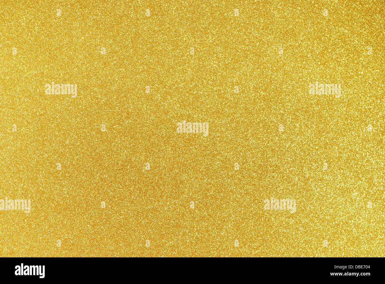 Background filled with shiny gold glitter Stock Photo