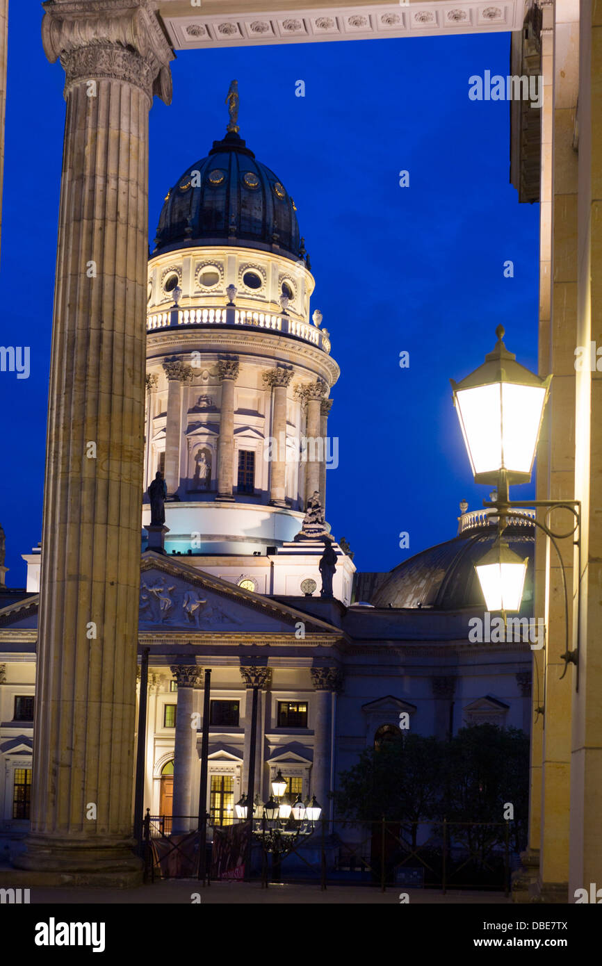 Deutscher Dom seen through pillars of Konzerthaus Gendarmenmarkt Mitte Berlin Germany Stock Photo