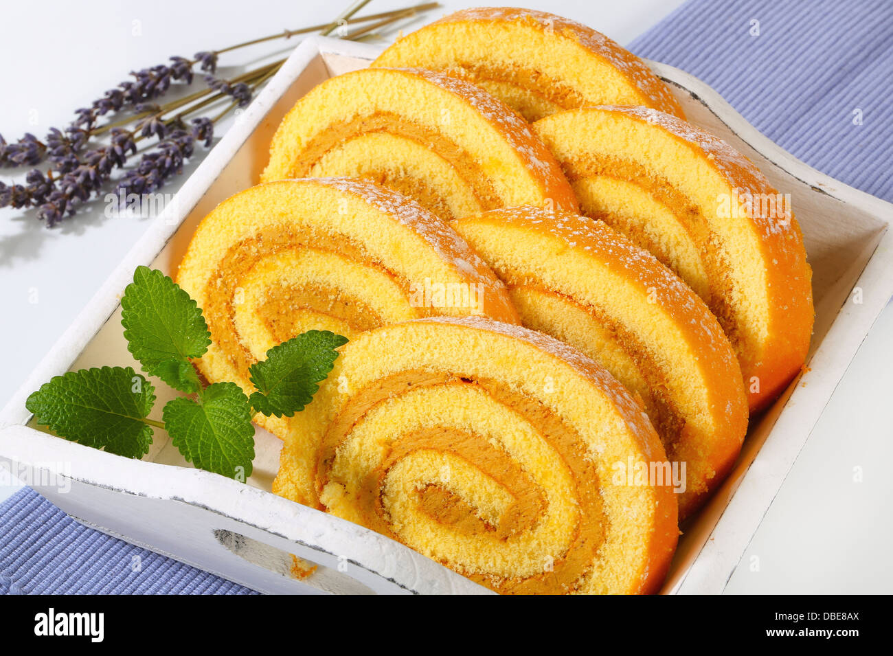 Slices of Swiss roll cake with mocha almond filling Stock Photo Alamy