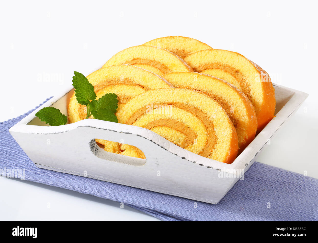 Slices of Swiss roll cake with mocha almond filling Stock Photo Alamy