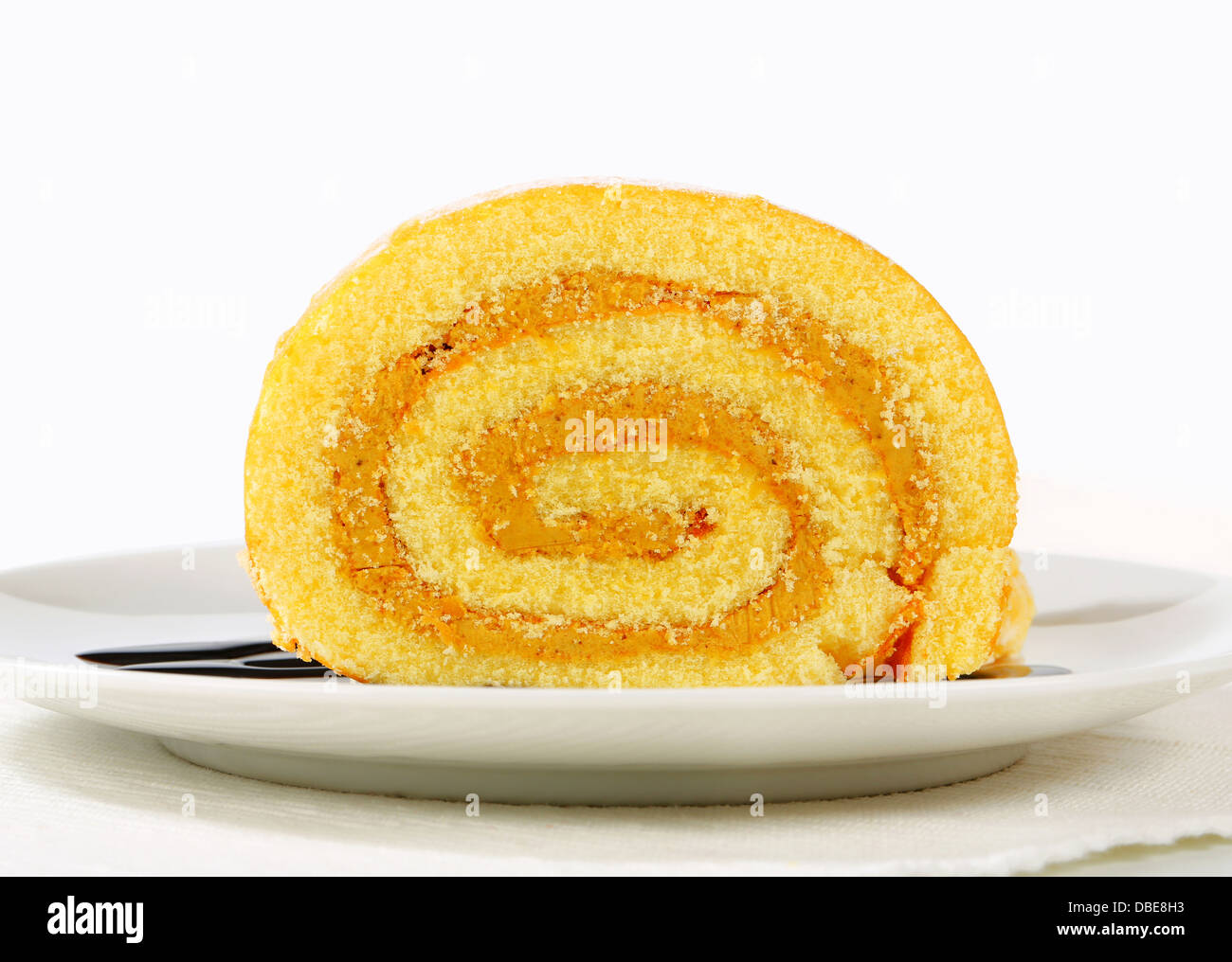 Swiss roll with peanut butter cream Stock Photo