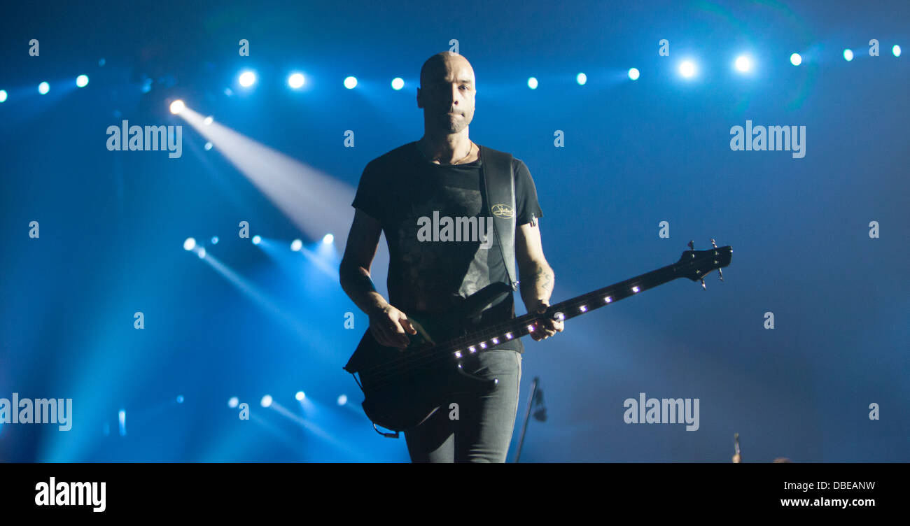 Muse live in concert, Telenor Arena, Norway. Christopher Wolstenholme Stock  Photo - Alamy