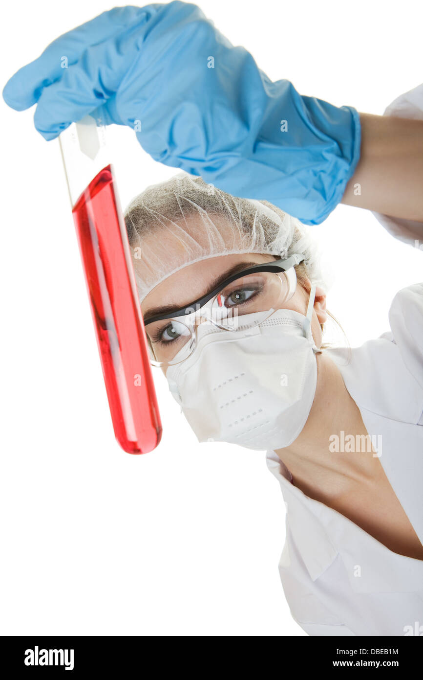 A professional lab worker with a test tube full of red fluid Stock Photo