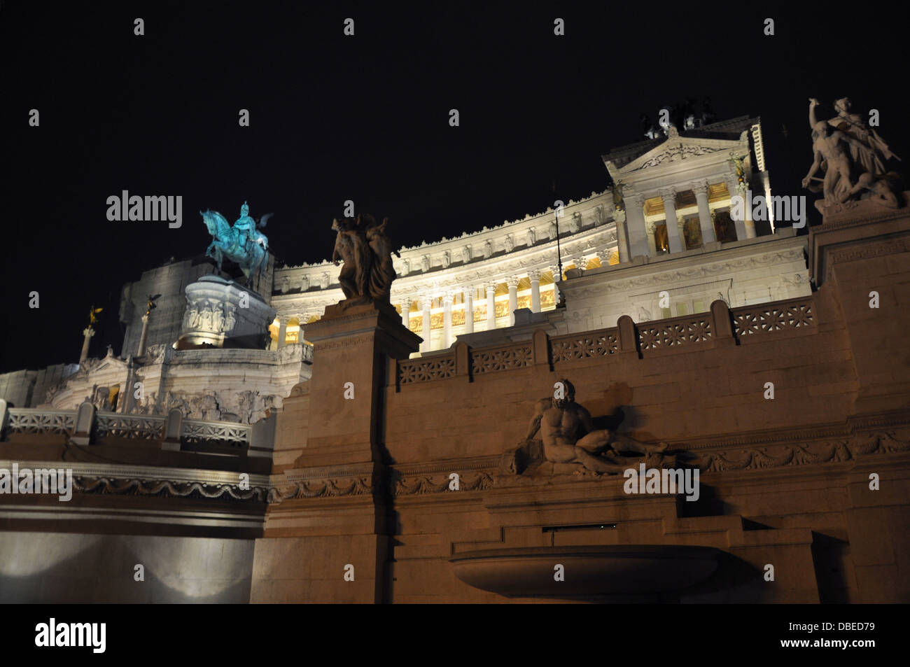 National Monument to Victor Emmanuel II at night. Stock Photo