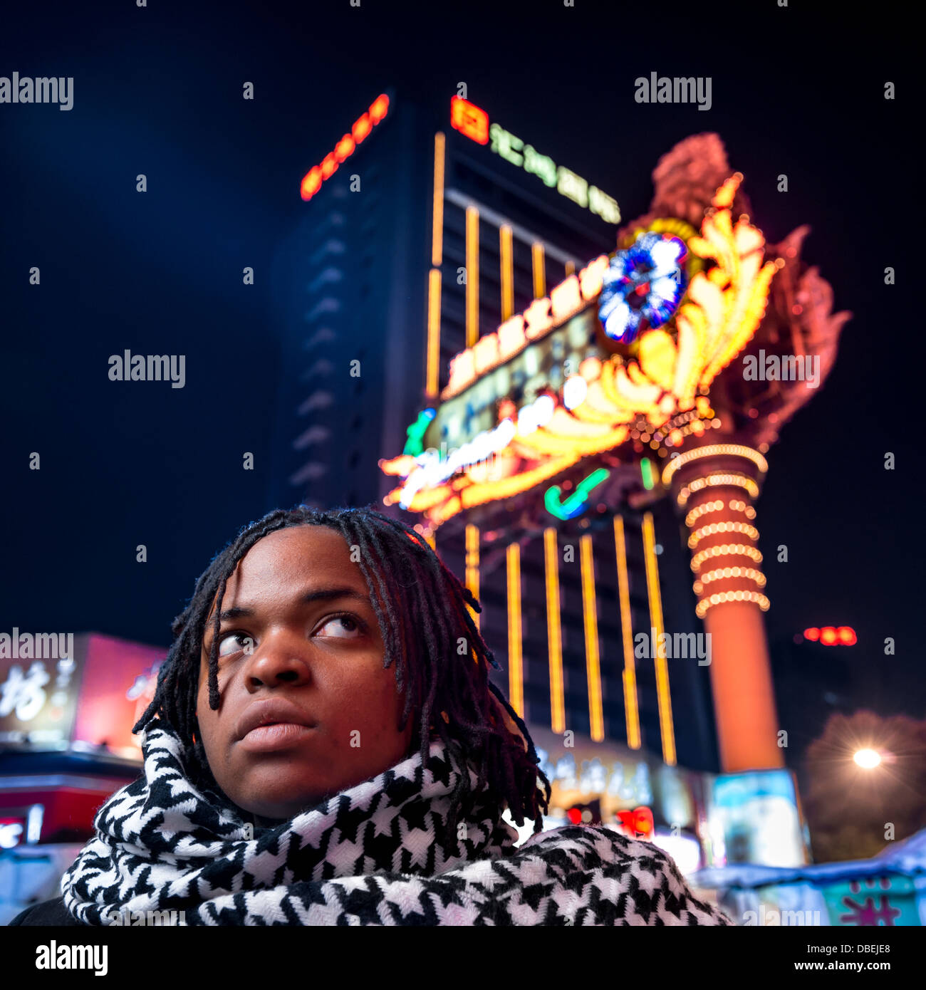 Student on the street in Nanjing at nighttime Stock Photo