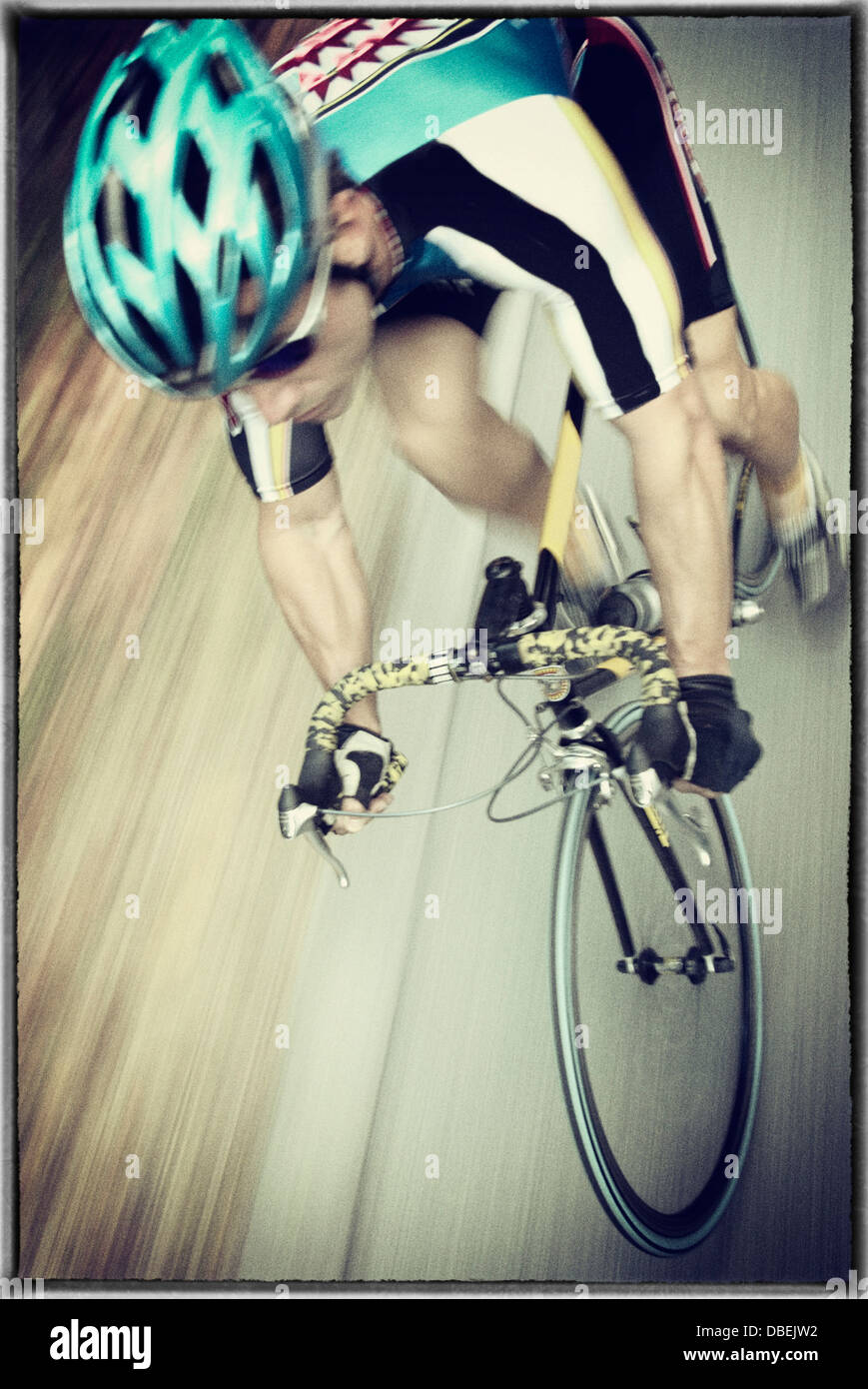 Blurred view of cyclist on paved road - Smartphone Captured Stock Image