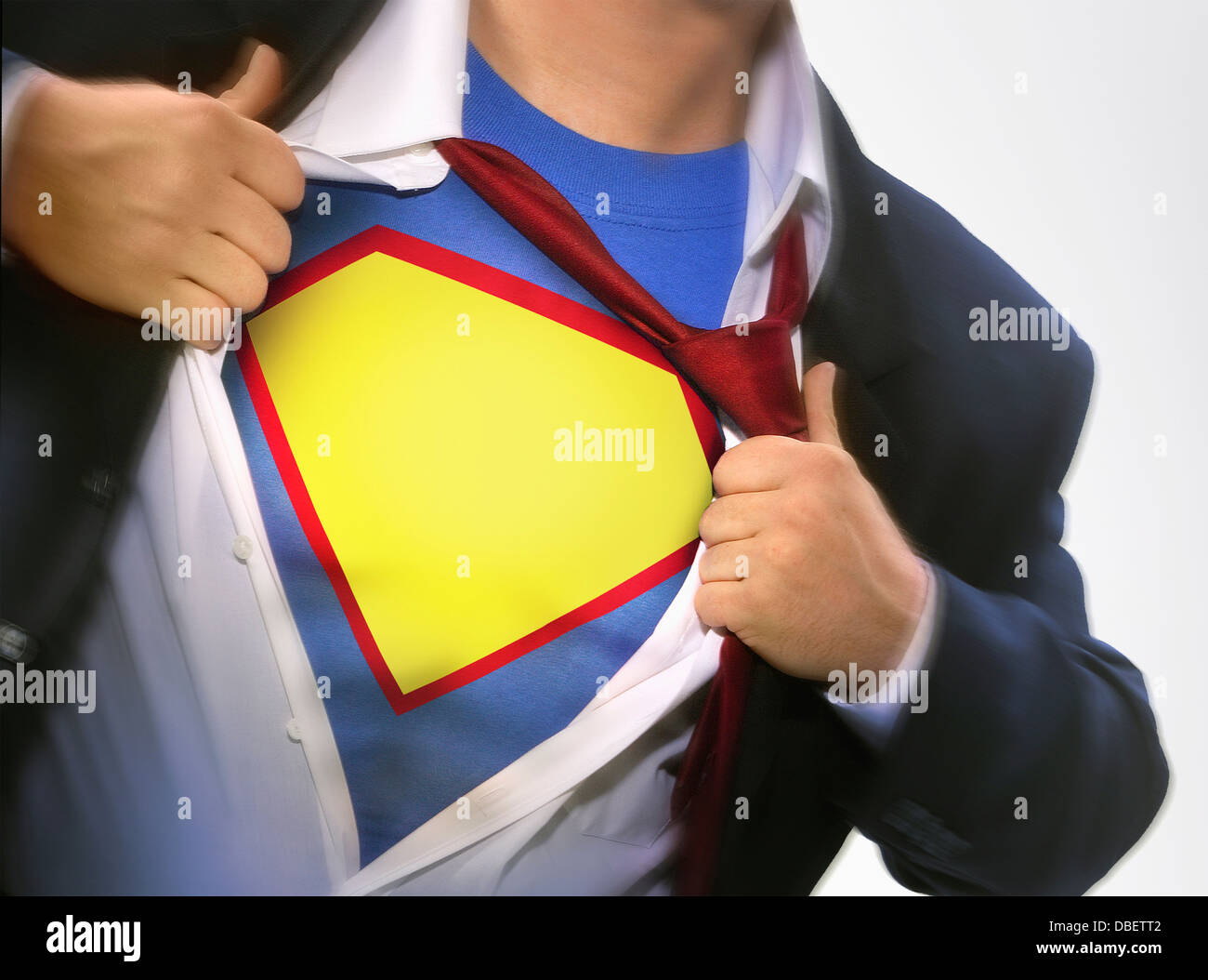 Businessman wearing superhero costume Stock Photo