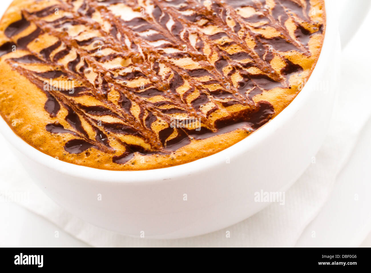 Coffee Napoleon in white cup on a white background Stock Photo - Alamy