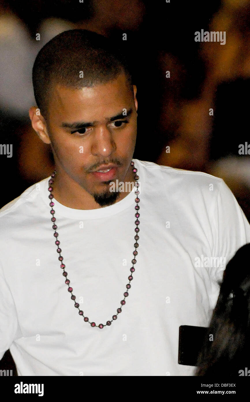 Rapper J.Cole aka Jermaine Lamarr Cole spotted in the audience at Rihanna's 'Loud Tour' concert