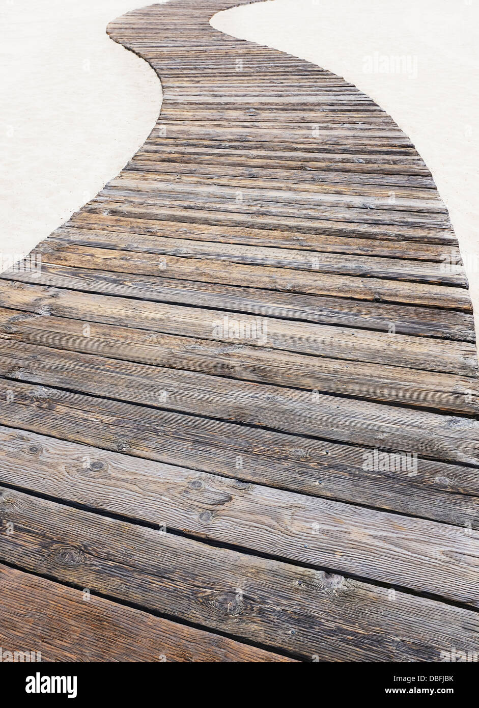 Wooden walkway on beach Stock Photo