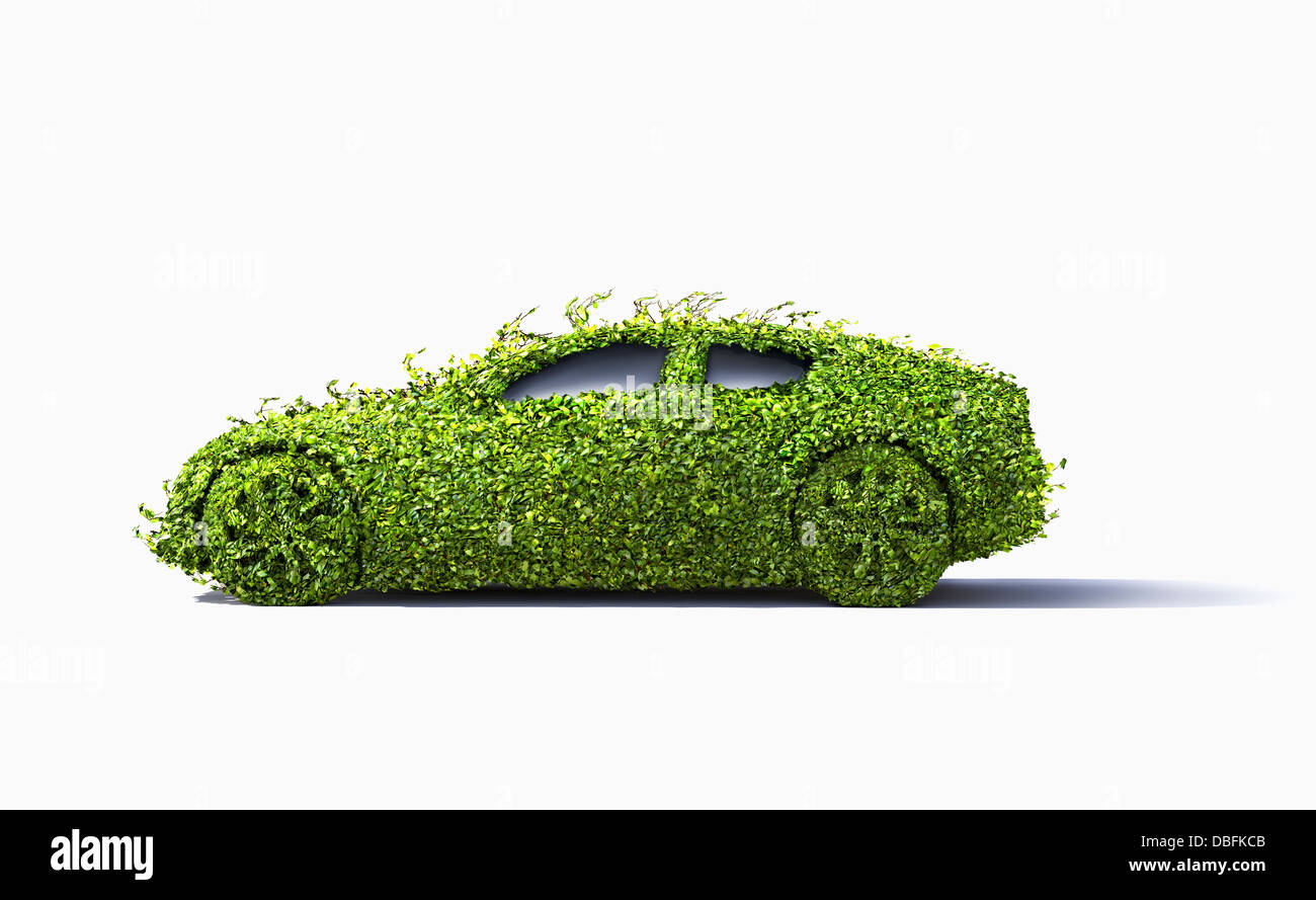Car covered in growing plants Stock Photo