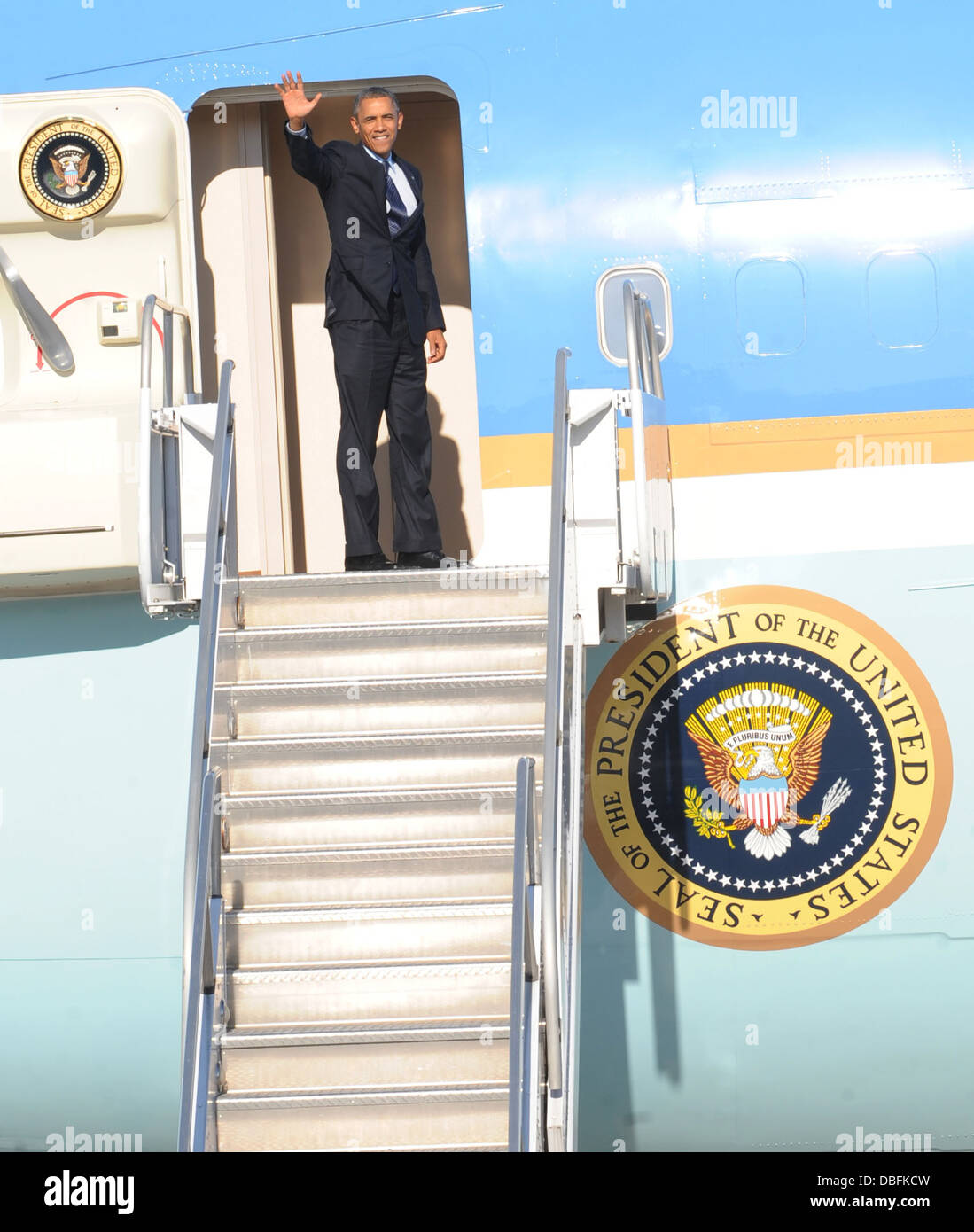 President Barack Obama waves farewell to Whiteman Air Force Base, July