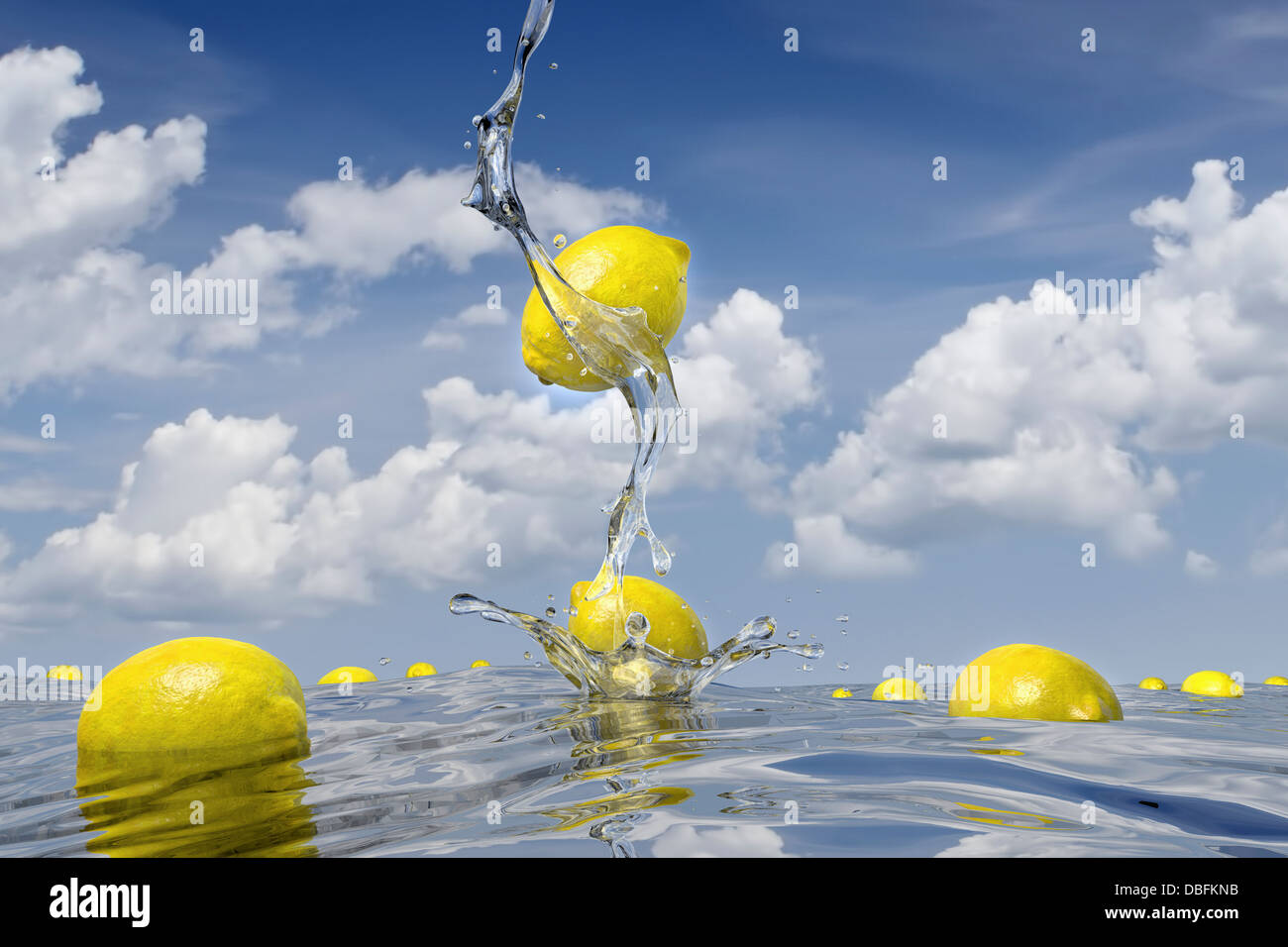 Lemons splashing into pool of water Stock Photo Alamy