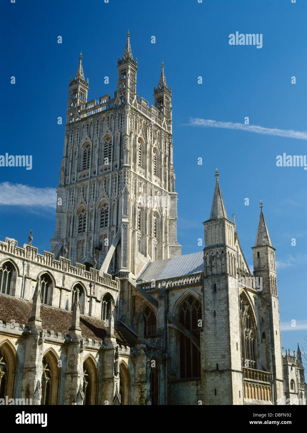 Perpendicular central tower (c 1450) and Norman S transept turrets of Gloucester Cathedral, England, the former Benedictine abbey of St Peter. Stock Photo