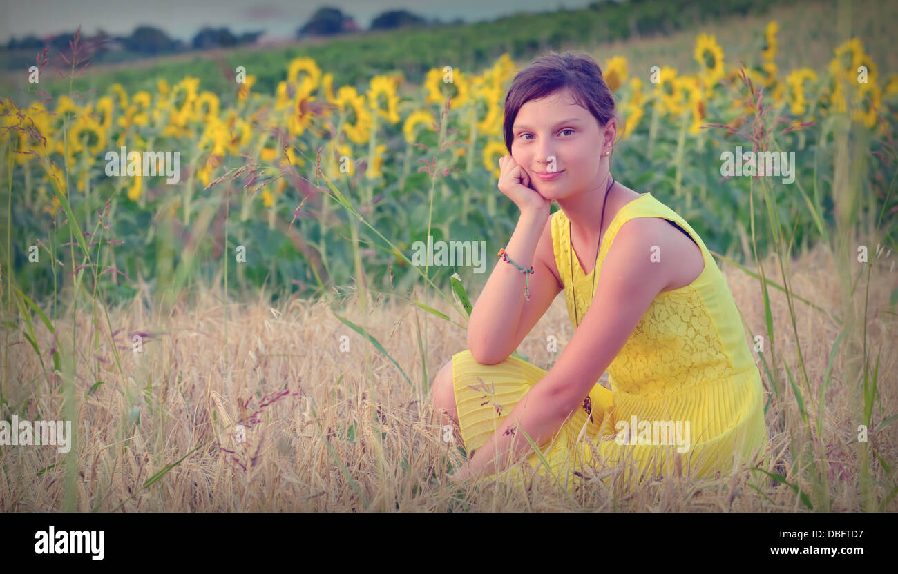 teen girl and sunflower in summer time Stock Photo - Alamy
