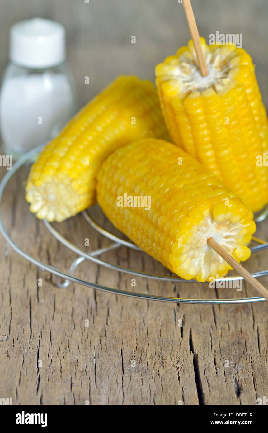 Boiled corns on old wood shoot in studio Stock Photo