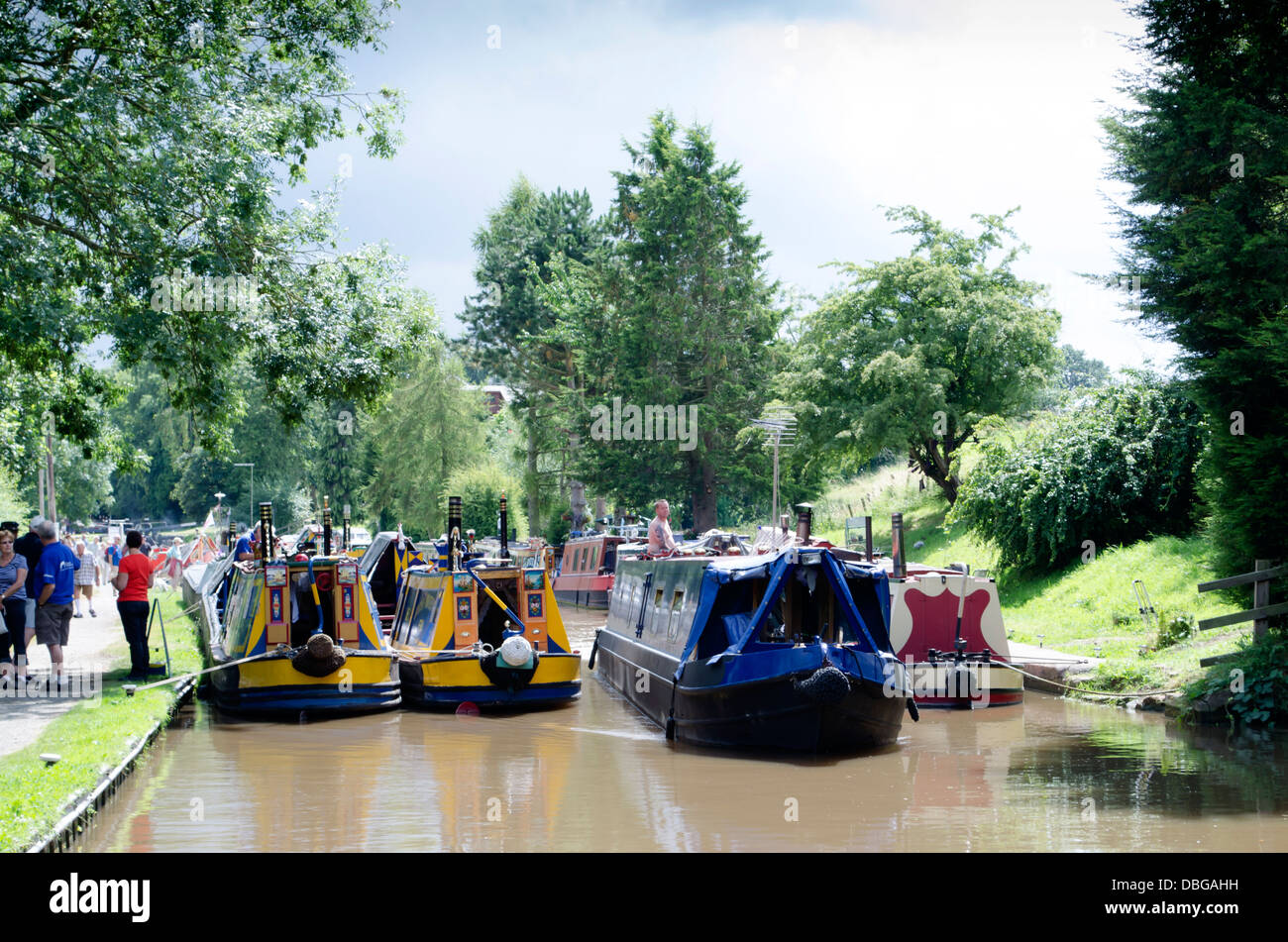 A gathering of canal boats on the Shropshire Union canal near Audlem, NW UK Stock Photo