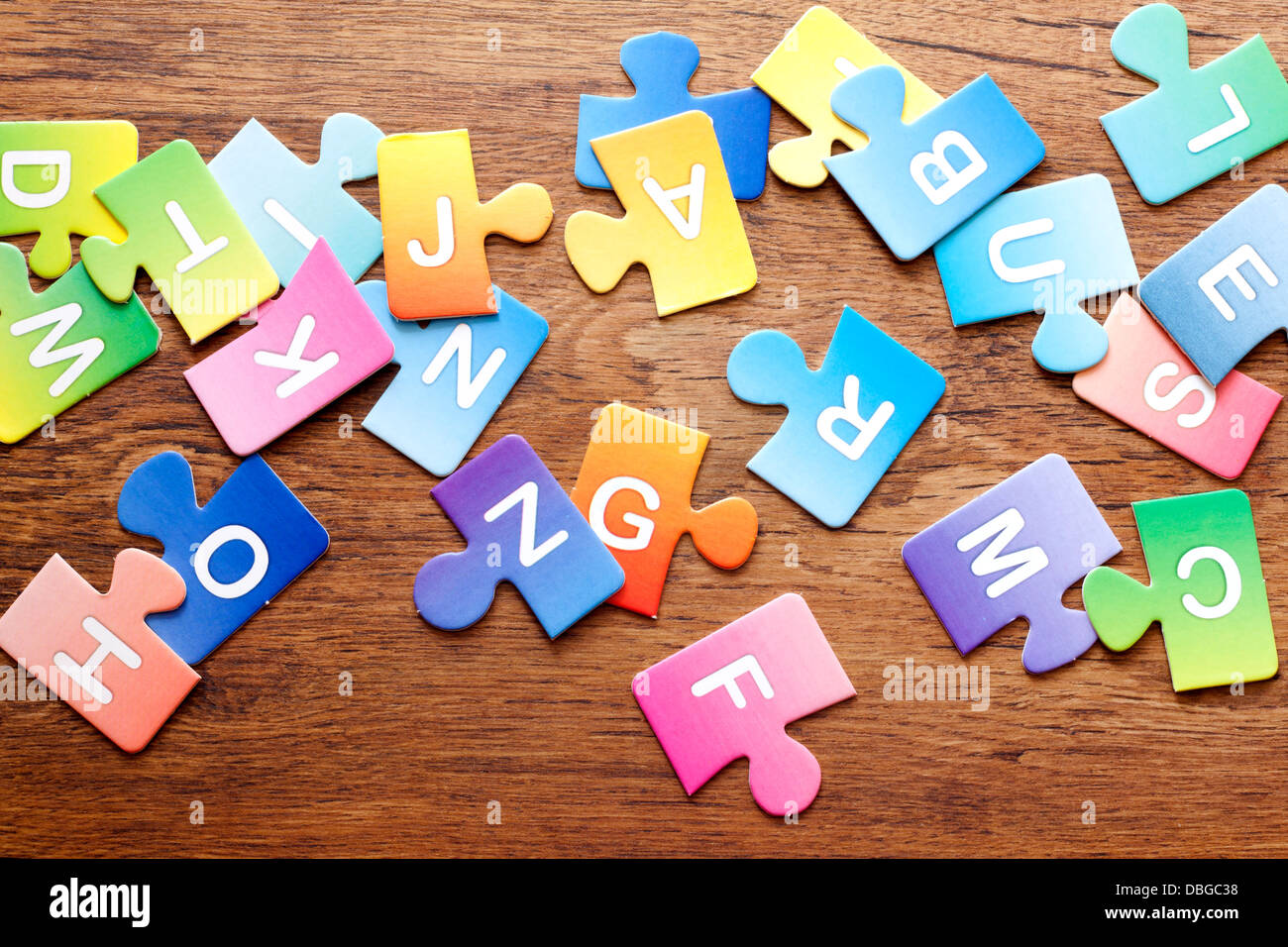 Colorful puzzle letters background concept Stock Photo - Alamy