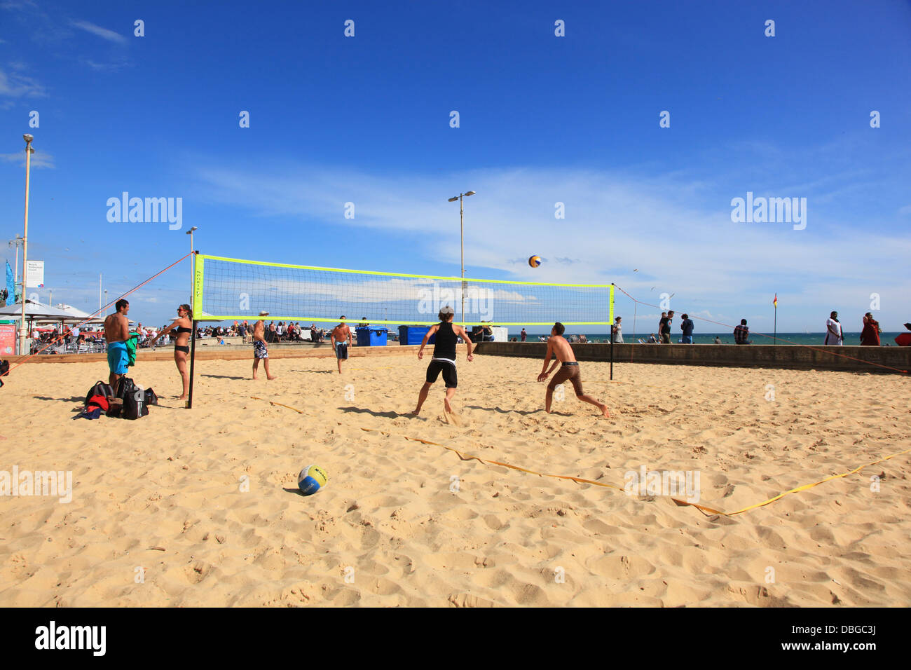 People playing volleyball on Brighton Beach Stock Photo