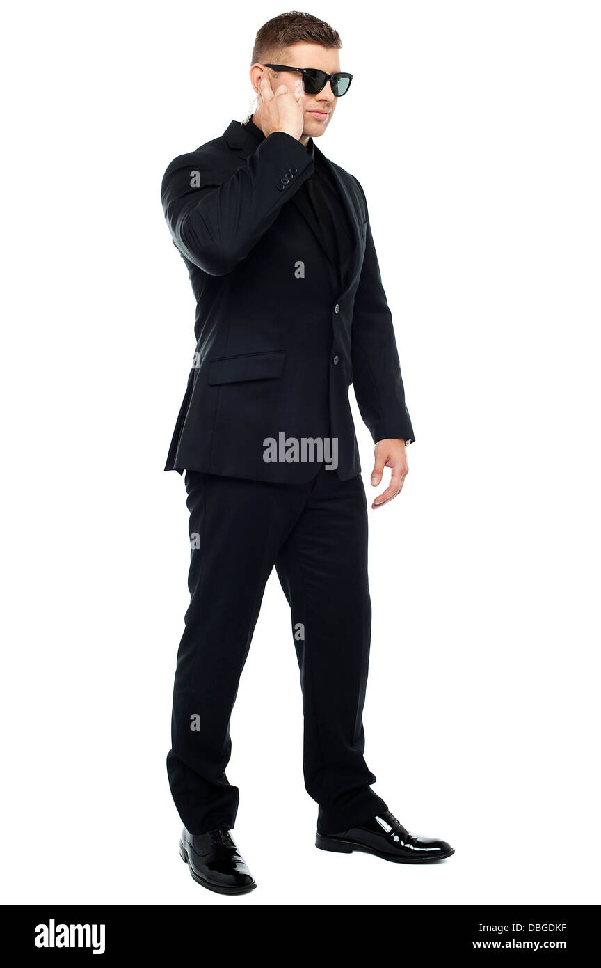 Security personnel listening to the information carefully Stock Photo