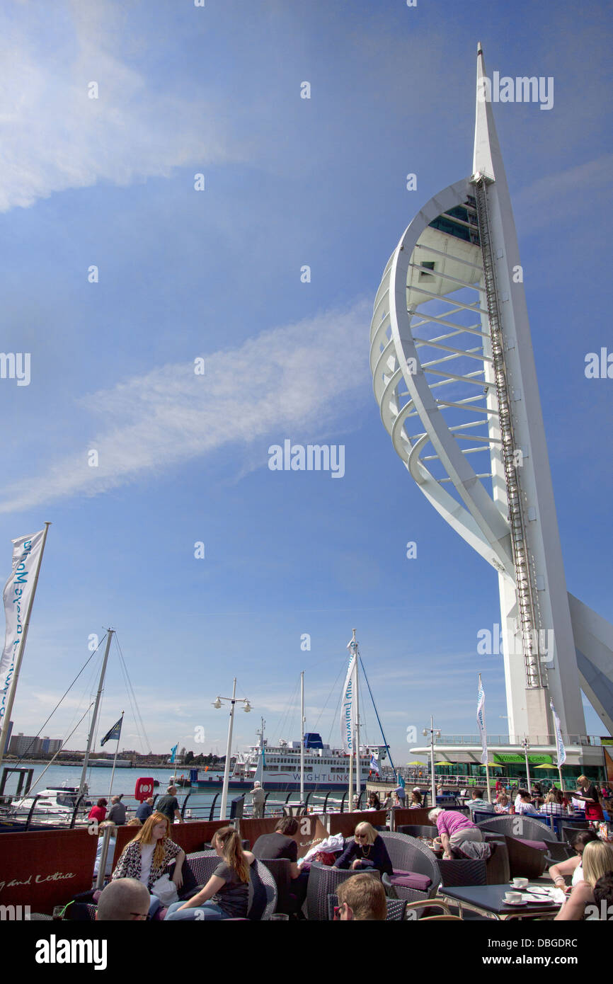Spinnaker Tower with Cafe in foreground  Gunwharf Quays, Portsmouth, Hampshire, England, UK Stock Photo