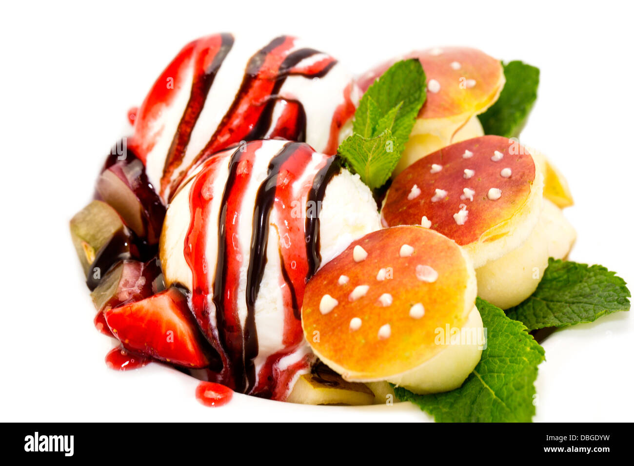 ice cream with caramel sauce and mint on a white background Stock Photo ...