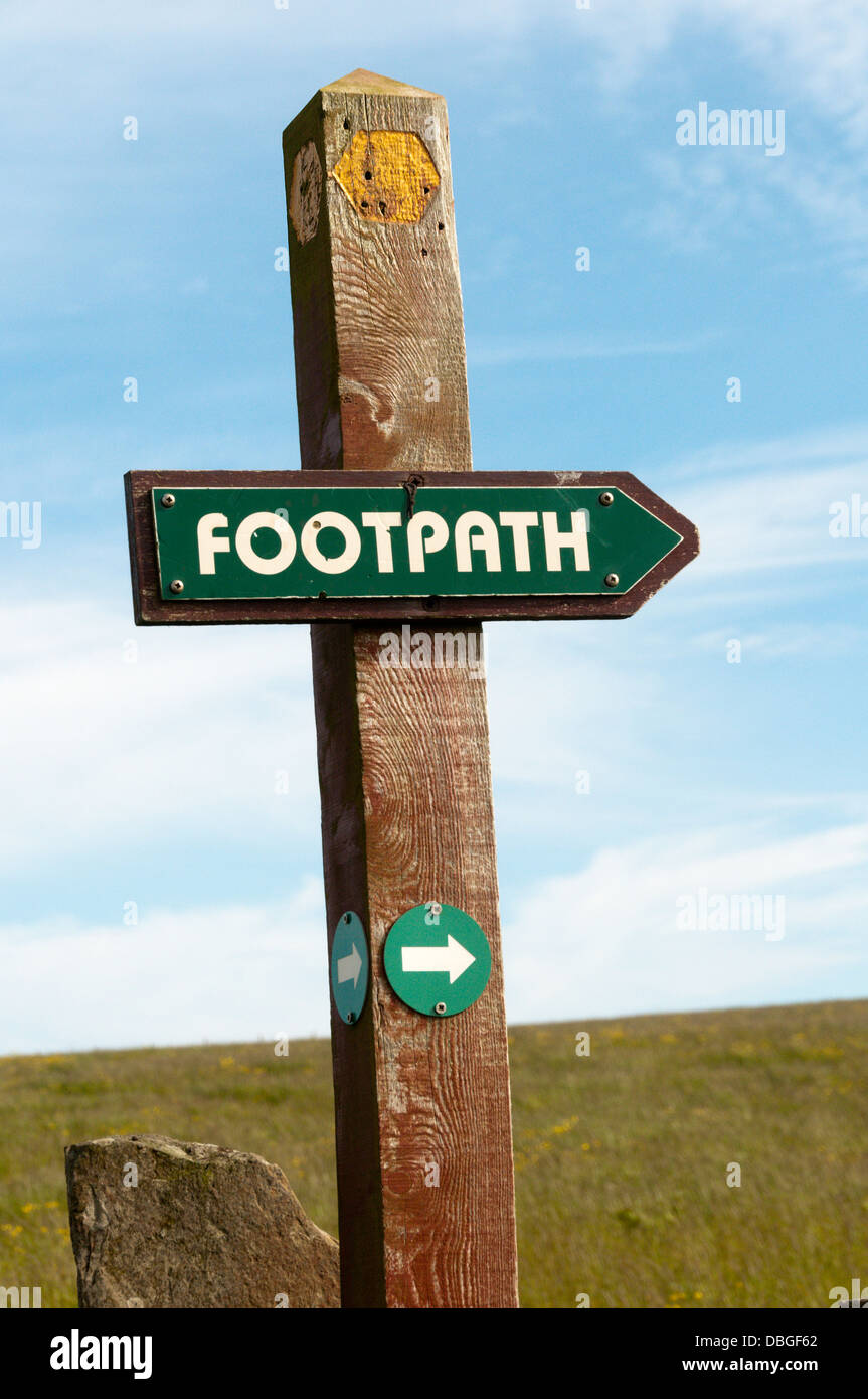 A footpath direction sign in the countryside. Stock Photo