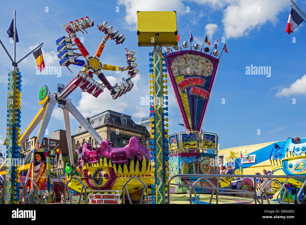 Fairground attractions at travelling funfair / traveling fun fair at the Gentse Feesten / Ghent Festivities in summer, Belgium Stock Photo