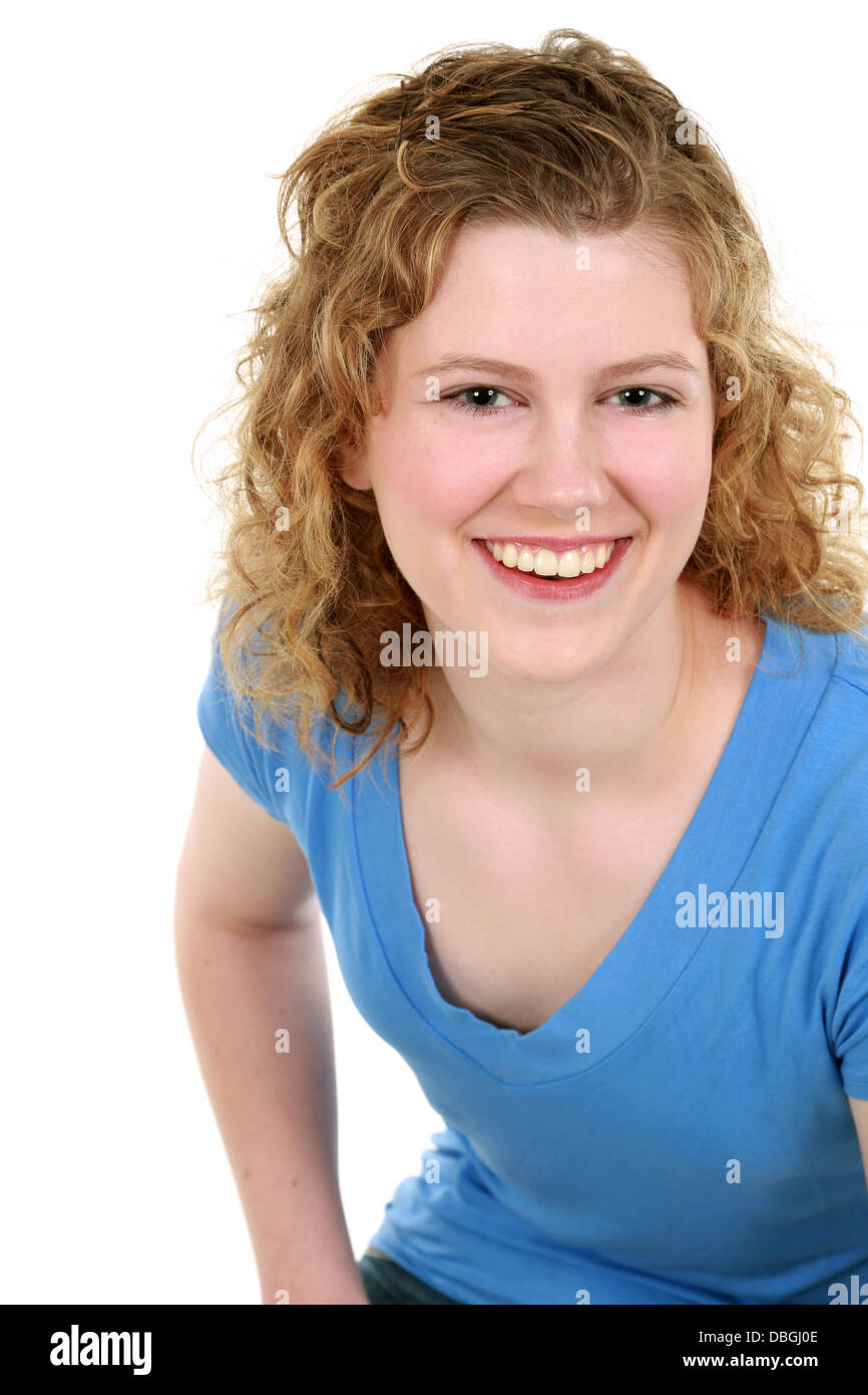 real teen girl with blonde curly hair smiling Stock Photo - Alamy