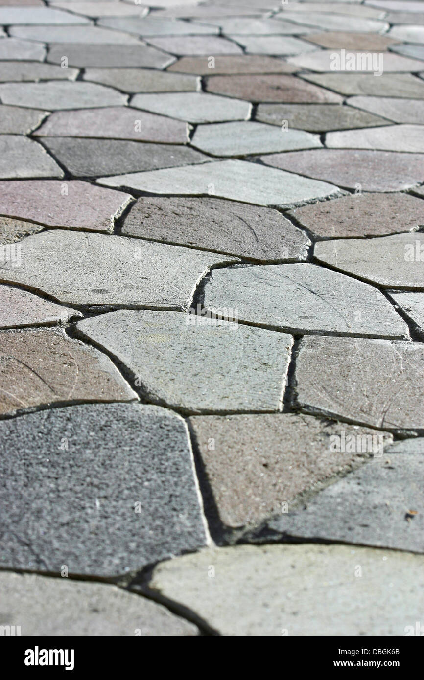 A very geometric stone walkway with many shapes Stock Photo