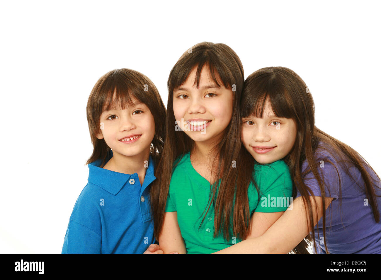 small group of asian children hugging with copy space Stock Photo