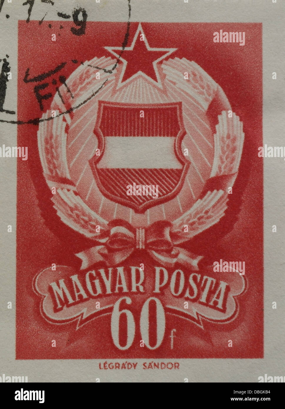 Red 60 filler  Magyar Posta Socialist Coat of Arms of Hungary ('Kadar Badge') postage stamp, issued Budapest, October 1957 Stock Photo