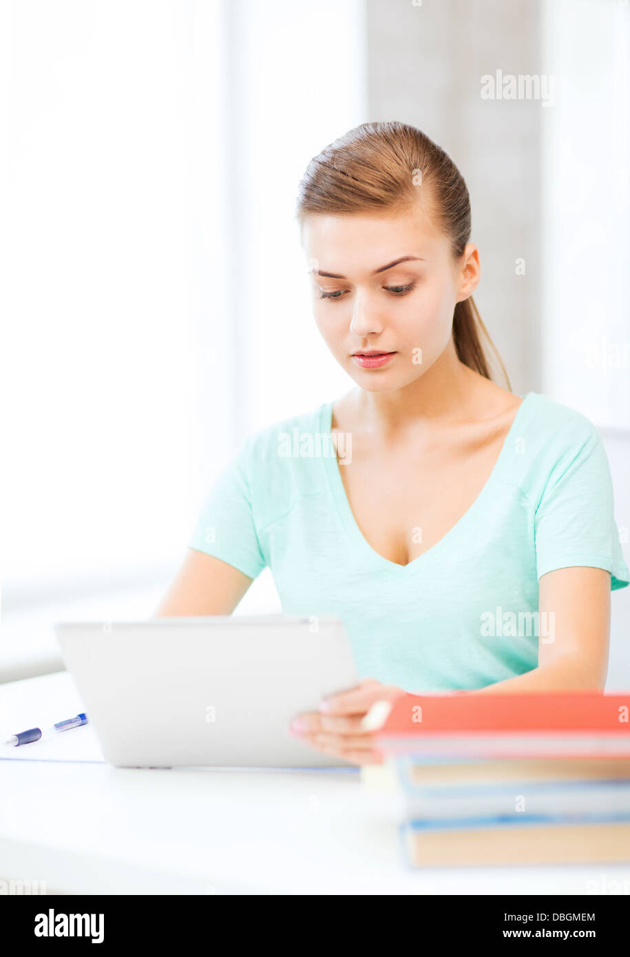smiling student girl with tablet pc Stock Photo - Alamy