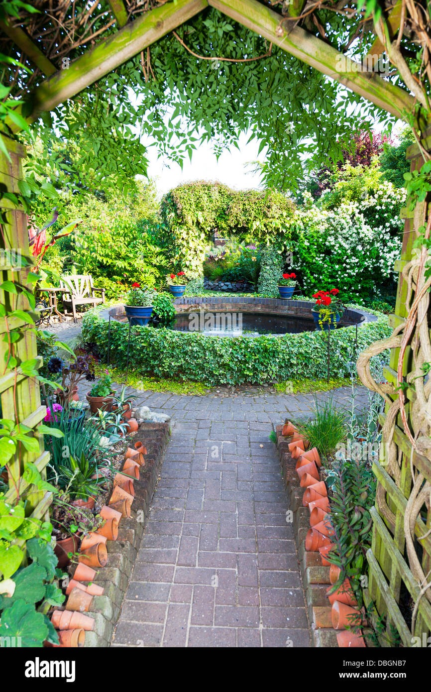 Typical English garden Arbour Arch archway Canopy Stock Photo