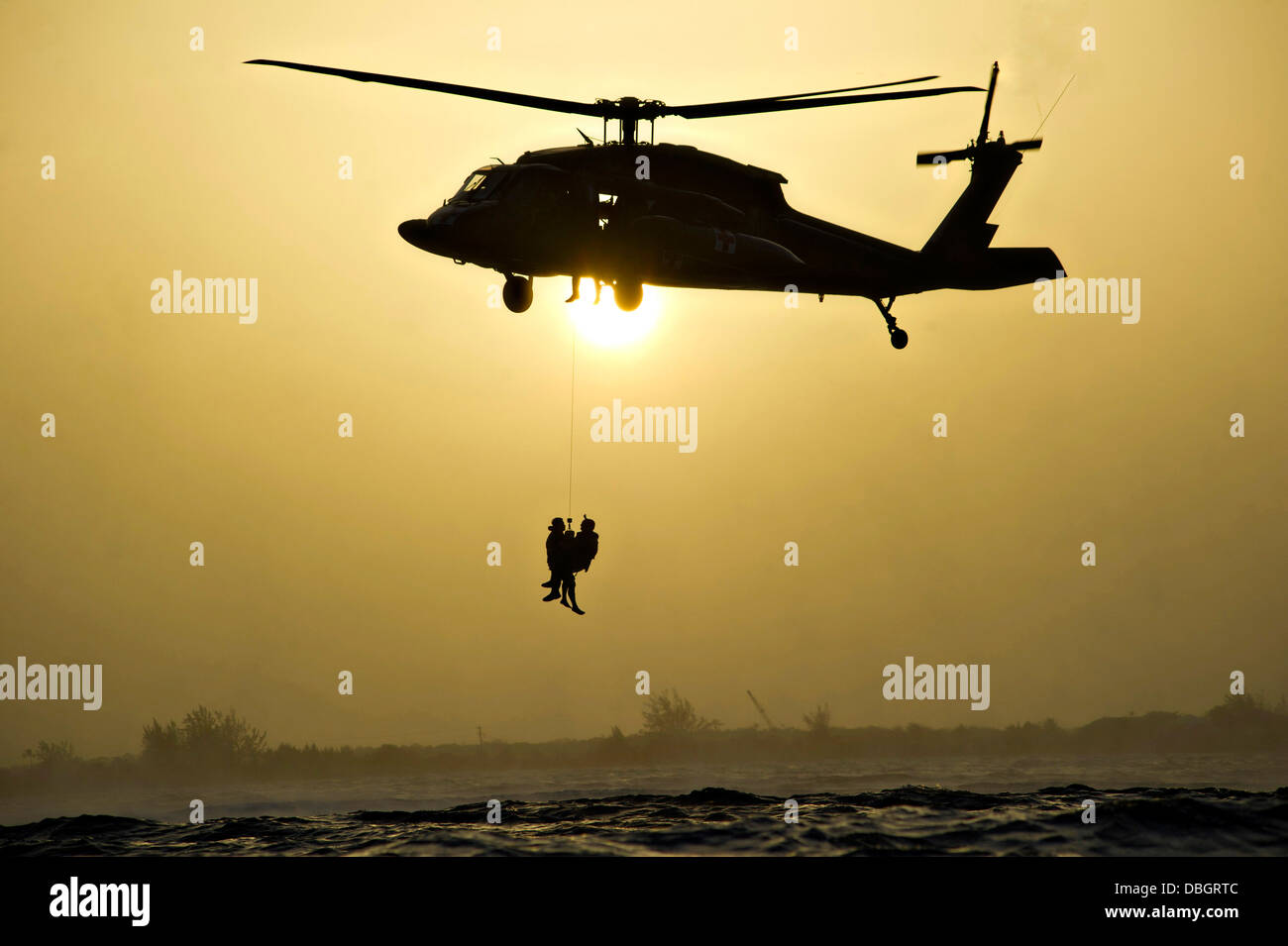 A US Army Flight Medic retrieves a Green Beret special forces soldier ...