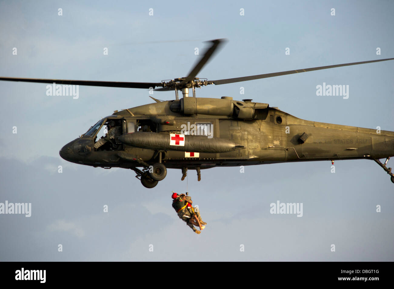 A US Army Flight Medic retrieves a Green Beret special forces soldier ...
