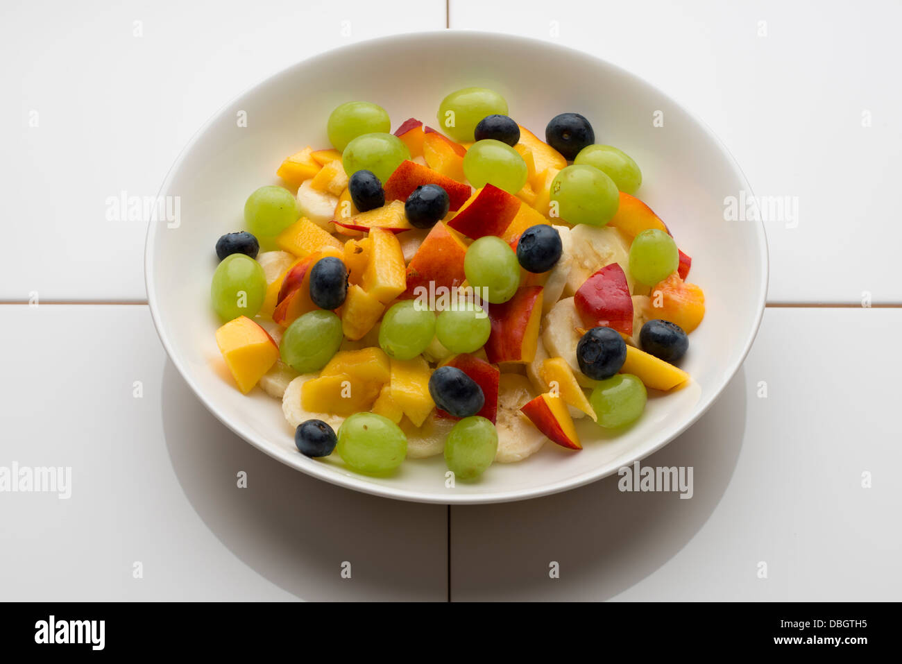 FOOD EDIBLE FRESH LOCAL SALAD VEGETABLE SIMPLE GOOD HEALTHY GOOD SALAD ON A PLATE POTATOES FRUIT PASTA CAULIFLOWER CHEESE Stock Photo