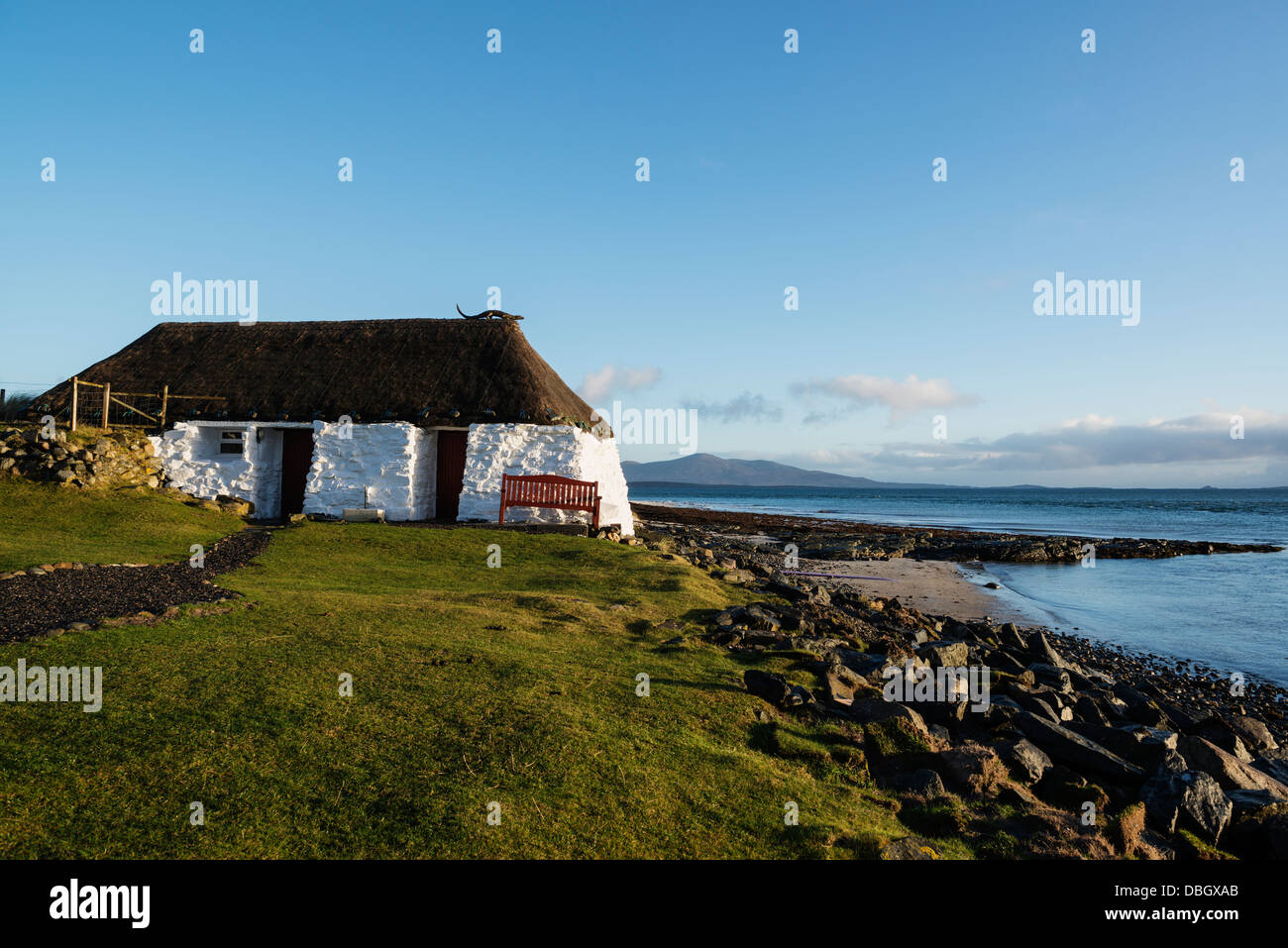 Thatched roof traditional blackhouse now used as youth hostel, Berneray, Outer Hebrides, Scotland Stock Photo