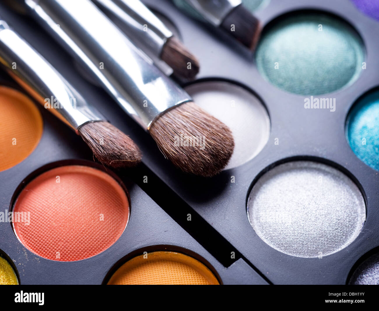 Makeup brushes and make-up eye shadows Stock Photo