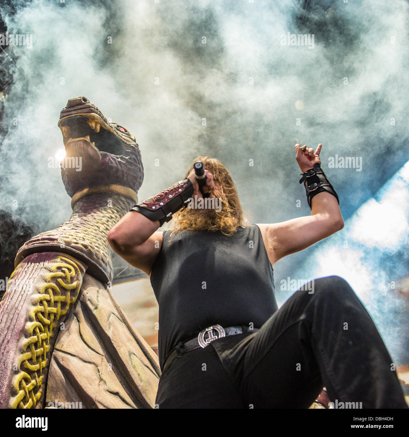 Swedish Heavy Metal band Amon Amarth performing live at Mayhem Fest 2013. Amon Amarth is a melodic death metal band from Tumba, Sweden. They got their moniker from the Sindarin name of Mount Doom, a volcano in J. R. R. Tolkien′s Middle-earth. The band's lyrics revolve around Viking history and mythology. The band is vocalist Johan Hegg, guitarists Olavi Mikkonen and Johan Söderberg, bassist Ted Lundström and drummer Fredrik Andersson Stock Photo