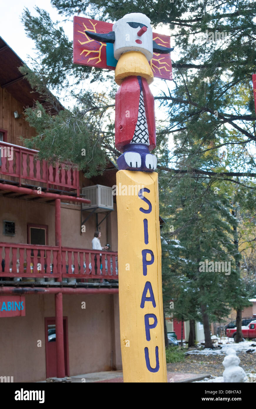A totem pole stands in front of the lodge at the Sipapu Ski Area in Northern New Mexico. Stock Photo