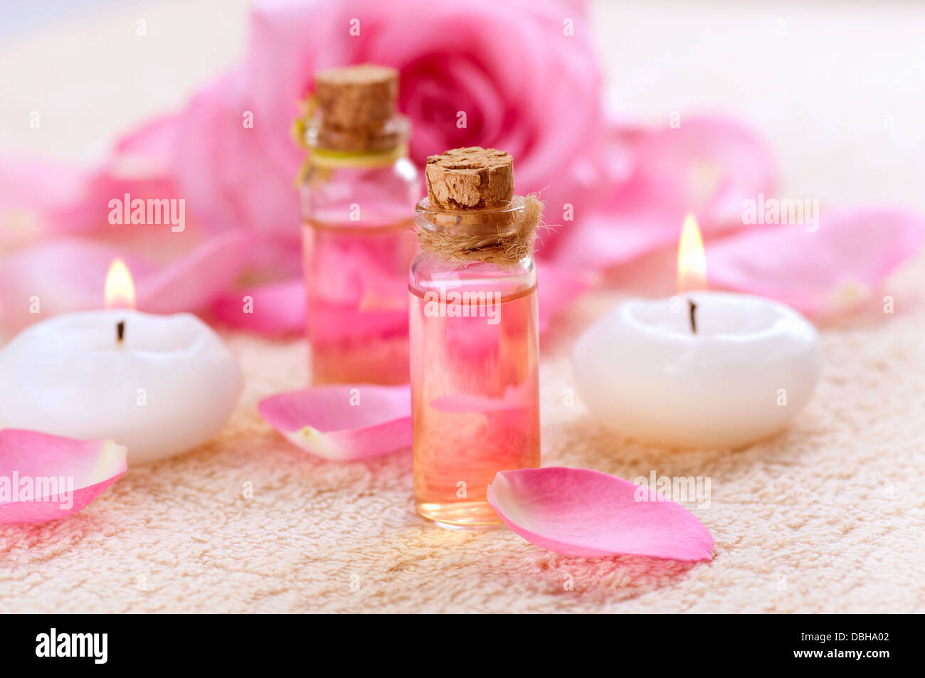 Bottles of Essential Oil for Aromatherapy. Rose Spa Stock Photo