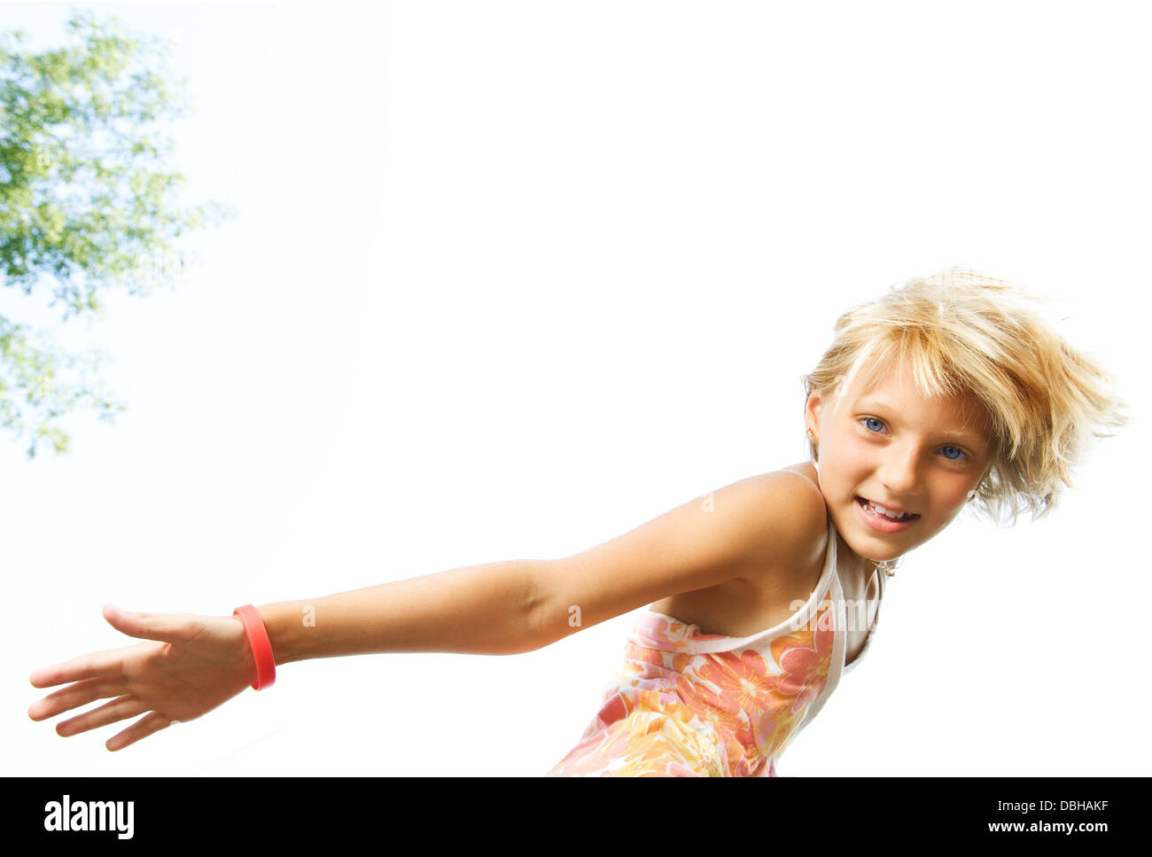 Happy Cute Little Girl Over Blue Sky. Outdoors Stock Photo - Alamy