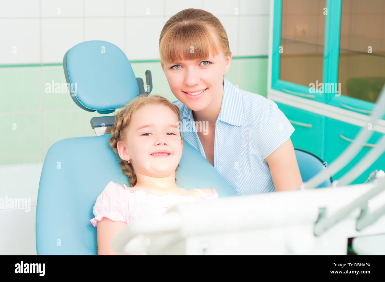 1 800 dentist mother and daughter at kitchen table commercial