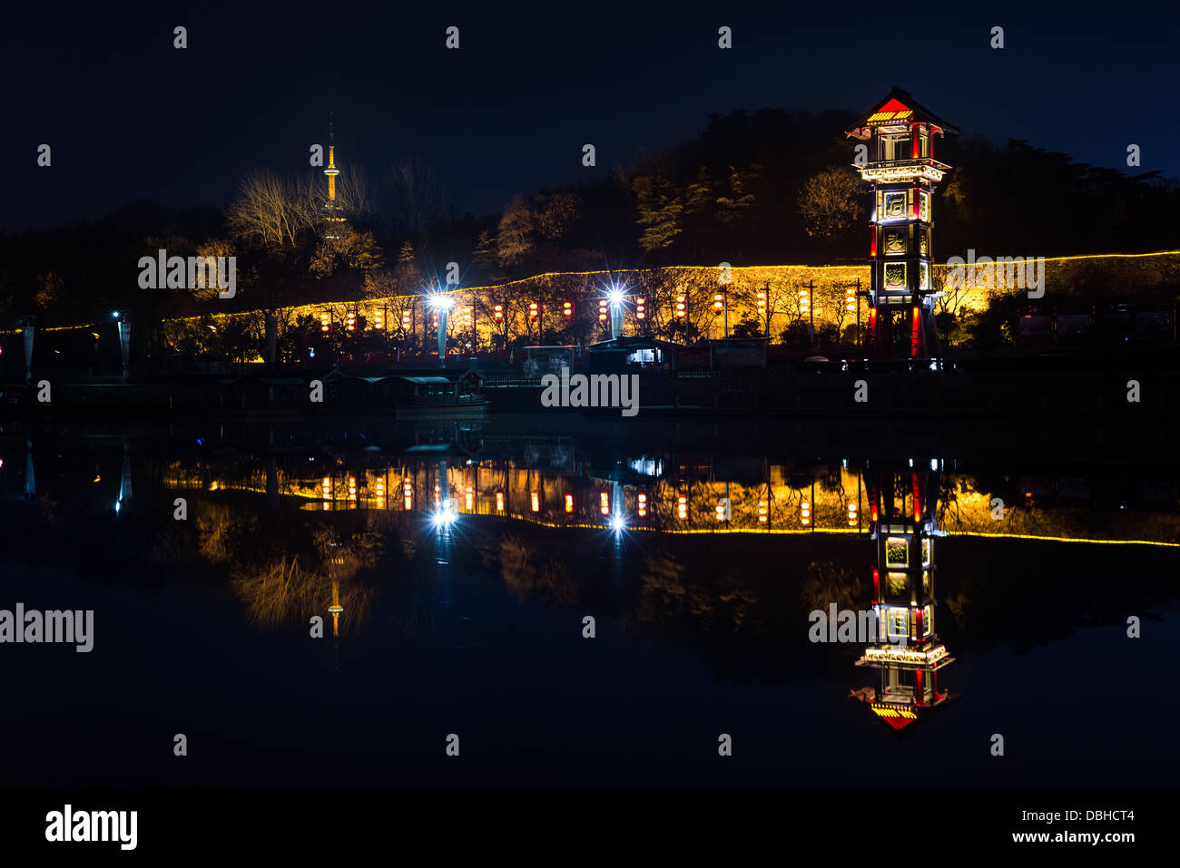 Nanjing, China. Night view on the Qinhuai river with the ancient city wall in the background Stock Photo