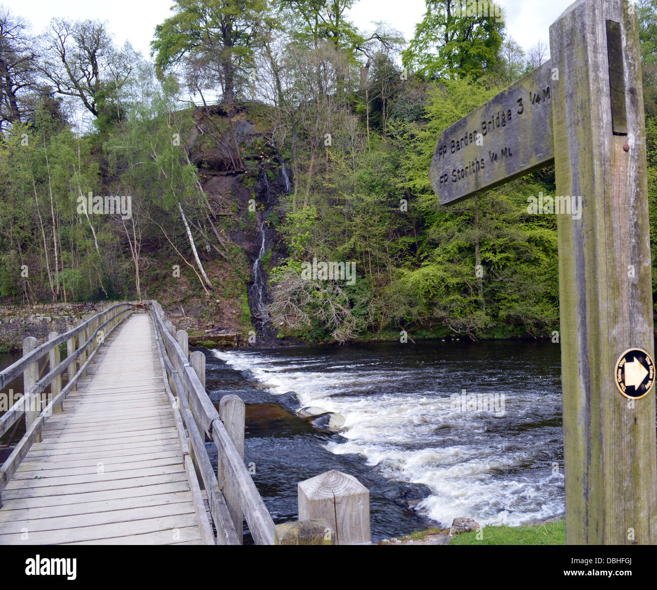 The Bridge over the River Wharfe in Bolton Abbey on the Dales Way Long Distance Footpath Wharfedale Yorkshire Stock Photo