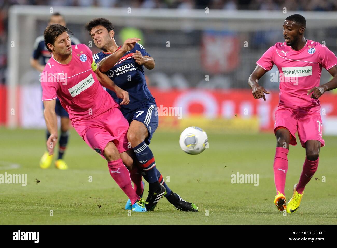 Lyon, France. 30th July, 2013. Clement Grenier (lyon) against Veroljug Salatic (grasshopper) during the Champions League Third Round Qualifying game between Lyon and Grasshoppers from the Municipal De Gerland stadium. Credit:  Action Plus Sports/Alamy Live News Stock Photo