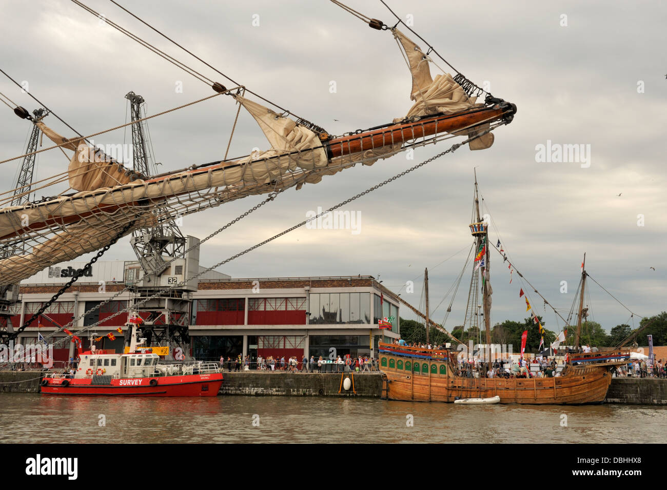 Bristol City docks with sailing tall ship bowsprit and replica of John Cabots ship the Mathew Stock Photo