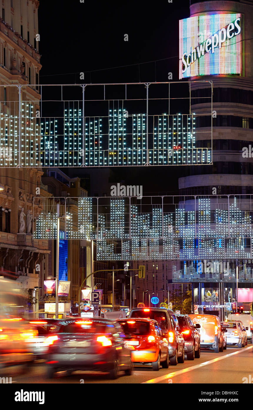 Traffic at Gran via street with string lights at Christmas time. Madrid. Spain. Stock Photo